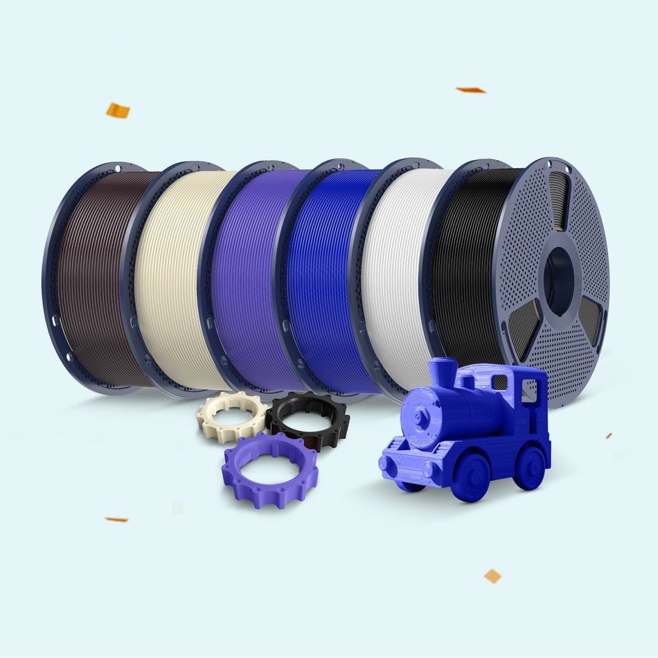 Spools of filament in various colors with a toy train model on a light blue background, celebrating a 12th anniversary.