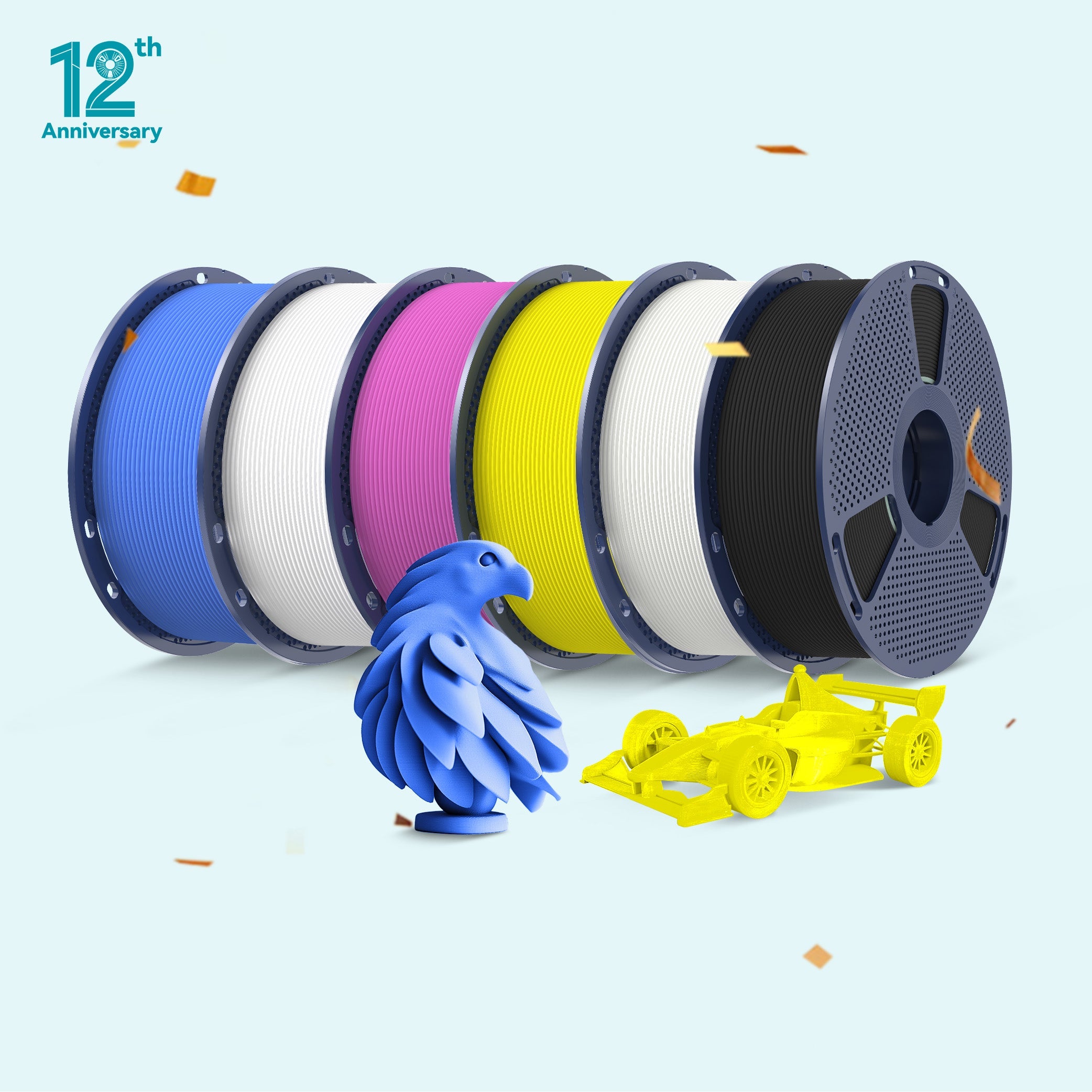 Colorful spools of filament with 3D printed models on a light blue background, celebrating a 12th anniversary.